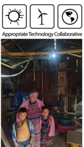 A woman and two children beneath a solar-powered light in their home in Guatemala, July 2026.